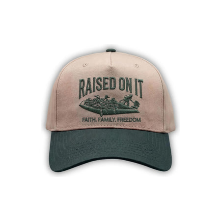 Outboard Legacy Hat in Mudboat (green brim, green stitch) with embroidered Raised On It mud boat logo and Faith Family Freedom