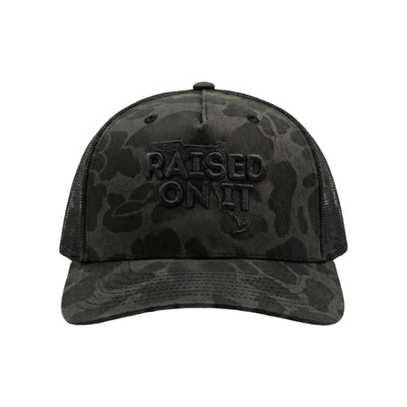 Raised On It Florida Logo embroidered trucker hat in Subdued Camo (black duck camo, black tonal stitch)